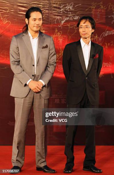 Japanese actor Matsuyama Kenichi arrives on the red carpet for the 14th Shanghai International Film Festival closing ceremony on June 19, 2011 in...