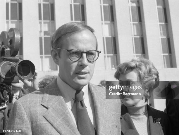 John W. Dean III and his wife, Maureen, leave U.S. District Court after Dean, President Nixon's former legal counsel pleaded guilty to conspiracy in...