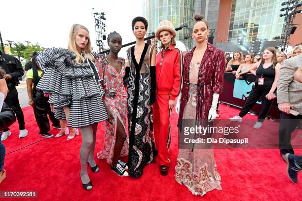 Abby Champion, Anok Yai, Lineisy Montero, Cara Taylor, and Hinandra Martinez attends the 2019 MTV Video Music Awards at Prudential Center on August...