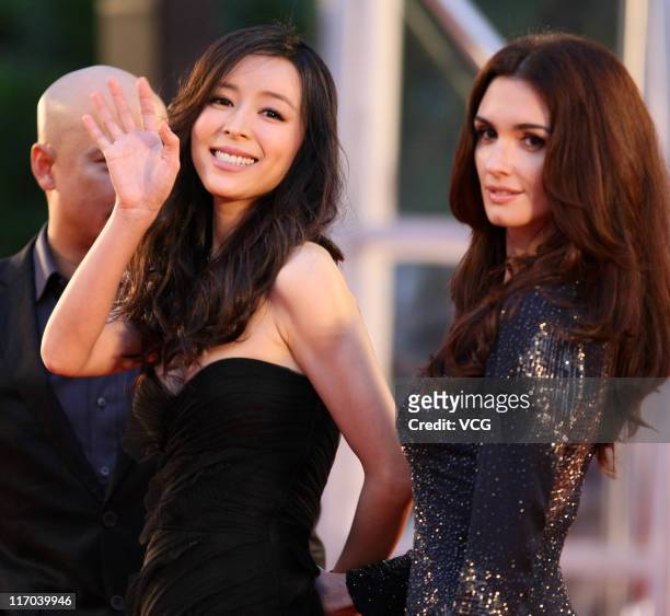 Chinese actress Zhang Jingchu and Spanish actress Paz Vega arrive at the red carpet of the 14th Shanghai International Film Festival closing ceremony...