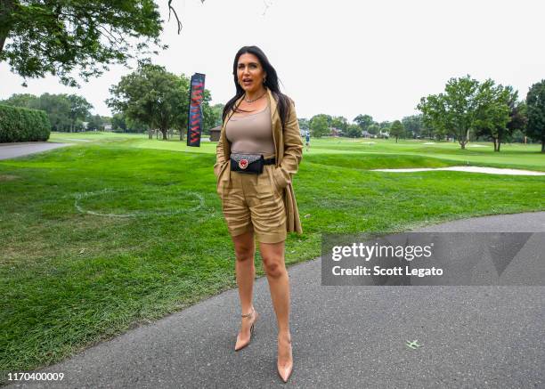 Molly Qerim Rose poses at the Jalen Rose Leadership Academy Golf Tournament presented by Tom Gores & Platinum Equity held at Detroit Golf Club at...