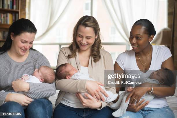 a multi-ethnic groups of young moms - manta de bebé imagens e fotografias de stock