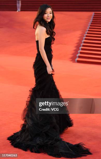 Chinese actress Zhang Jingchu arrives at the red carpet of the 14th Shanghai International Film Festival closing ceremony at Shanghai Grand Theatre...