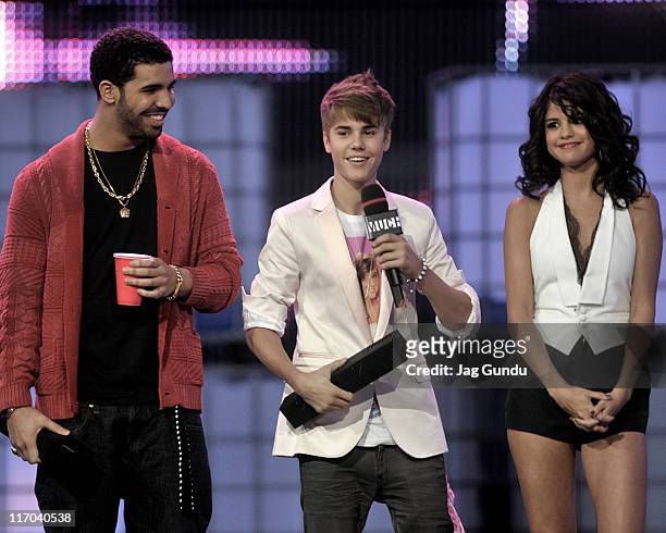 Drake, Justin Bieber and Selena Gomez on stage at the 22nd Annual MuchMusic Video Awards at the MuchMusic HQ on June 19, 2011 in Toronto, Canada.