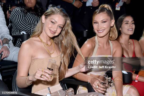 Gigi Hadid and Bella Hadid attend the 2019 MTV Video Music Awards at Prudential Center on August 26, 2019 in Newark, New Jersey.