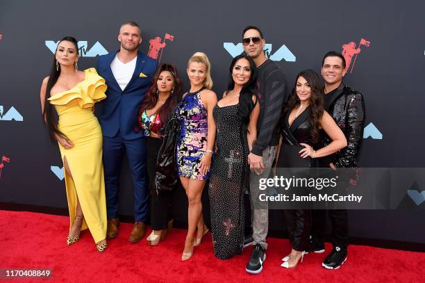 Jenni Farley, Clayton Carpinello, Nicole Polizzi, Lauren Sorrentino, Amy Paffrath, Angela Pivarnick, and Deena Nicole Buckner of the Jersey Shore...