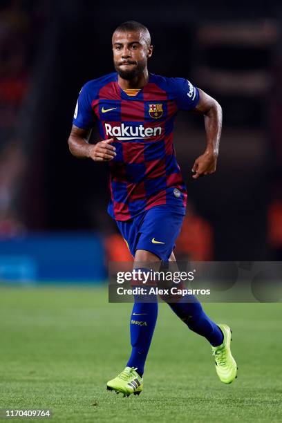 Rafinha of FC Barcelona runs during the Liga match between FC Barcelona and Real Betis Balompie at Camp Nou on August 25, 2019 in Barcelona, Spain.