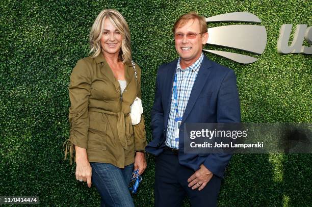 Nadia Comaneci and Bart Conner attend USTA 19th Annual Opening Night Gala Blue Carpet at USTA Billie Jean King National Tennis Center on August 26,...