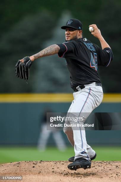 Hector Noesi of the Miami Marlins pitches against the Colorado Rockies in the first inning of a game at Coors Field on August 17, 2019 in Denver,...