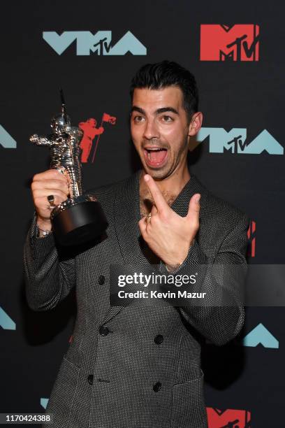 Joe Jonas poses with award during the 2019 MTV Video Music Awards at Prudential Center on August 26, 2019 in Newark, New Jersey.