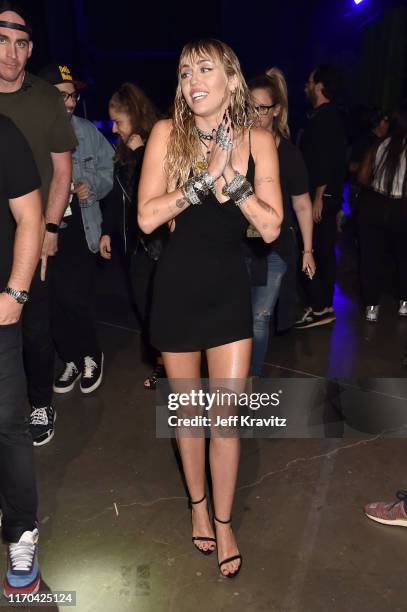 Miley Cyrus poses backstage during the 2019 MTV Video Music Awards at Prudential Center on August 26, 2019 in Newark, New Jersey.