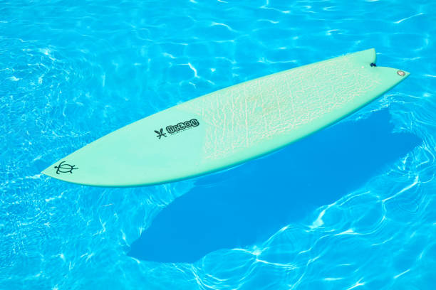 floating surfboard on the water
