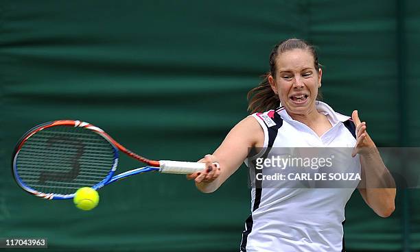 British player Katie O'Brien plays against Japanese player Kimiko Date-Krumm during the 2011 Wimbledon Tennis Championships at the All England Tennis...