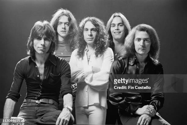 Rainbow , British rock band, pose for a group studio portrait for use on the cover of the band's album, 'Rising', in 1976.