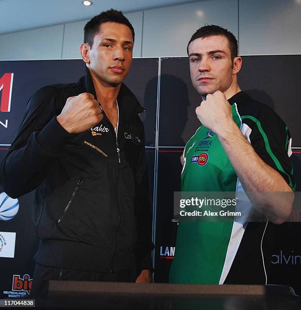 Felix Sturm of Germany and Matthew Macklin of Ireland pose during the Felix Sturm v Matthew Macklin press conference at Hotel Im Wasserturm on June...