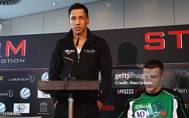 Felix Sturm of Germany and Matthew Macklin of Ireland attend the Felix Sturm v Matthew Macklin press conference at Hotel Im Wasserturm on June 20,...