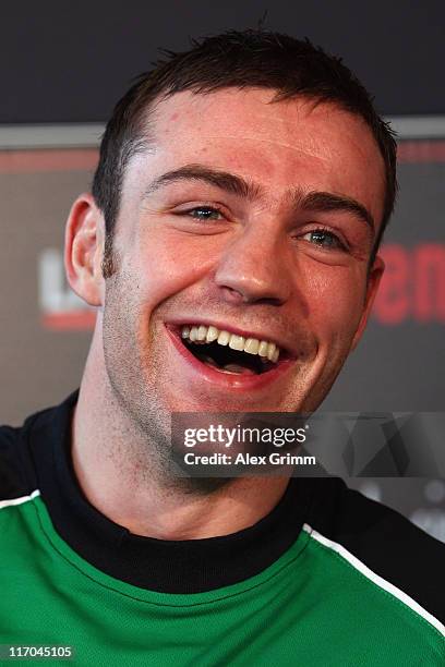 Matthew Macklin of Ireland laughs during the Felix Sturm v Matthew Macklin press conference at Hotel Im Wasserturm on June 20, 2011 in Cologne,...