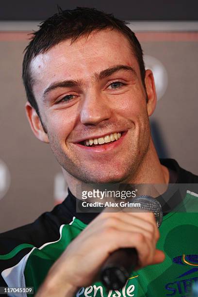 Matthew Macklin of Ireland laughs during the Felix Sturm v Matthew Macklin press conference at Hotel Im Wasserturm on June 20, 2011 in Cologne,...