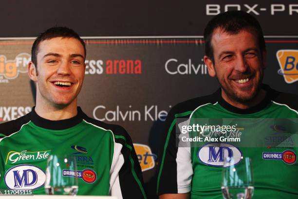 Matthew Macklin of Ireland and his coach Joe Gallagher attend the Felix Sturm v Matthew Macklin press conference at Hotel Im Wasserturm on June 20,...