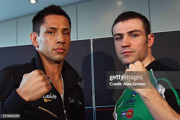 Felix Sturm of Germany and Matthew Macklin of Ireland pose during the Felix Sturm v Matthew Macklin press conference at Hotel Im Wasserturm on June...