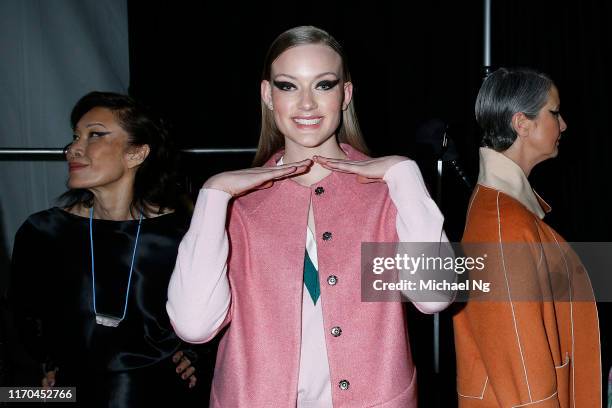 Model prepares backstage ahead of the Hailwood show during New Zealand Fashion Week 2019 at Auckland Town Hall on August 27, 2019 in Auckland, New...