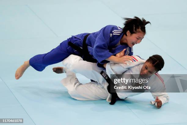 Kim Jisu of South Korea and Nekoda Smythe-Davis of Great Britain compete in the Women's - 57kg Pool D second round on day three of the World Judo...