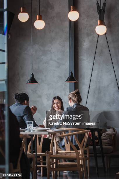 business people in a high-end restaurant - business meal stock pictures, royalty-free photos & images