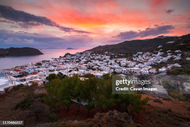 view of skala village on patmos island in greece. - patmos greece stock pictures, royalty-free photos & images