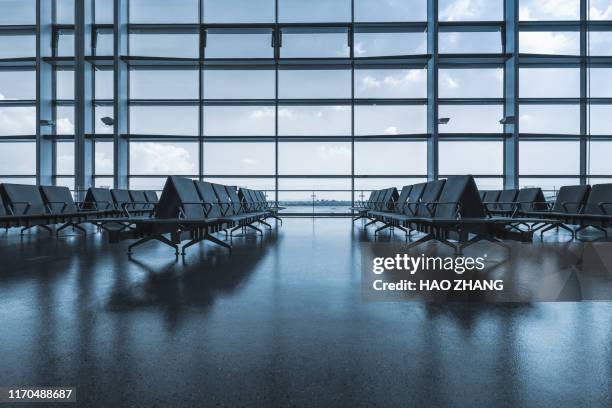 empty airport terminal waiting area - airport window stock pictures, royalty-free photos & images