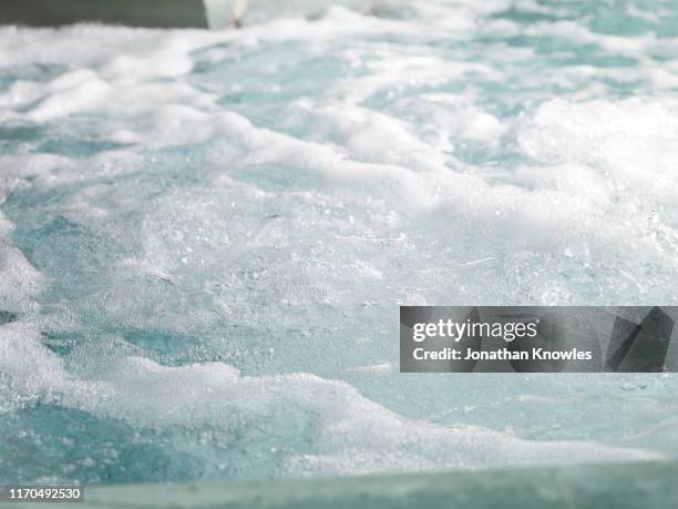 bubbles in water - hot tub stock pictures, royalty-free photos & images