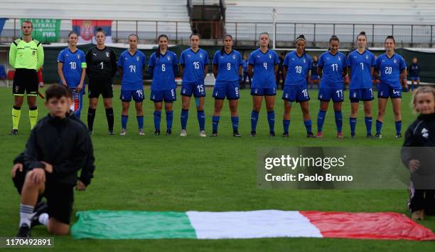 The Italy players sing their National Anthem during the friendly match between Italy U17 women and Serbia U17 women at Enzo Blasone stadium on...