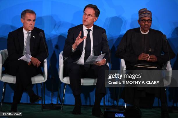 Nigerian President Muhammadu Buhari Netherlands Prime Minister Mark Rutte and Bank of England Governor Mark Carne meet during the Climate Action...