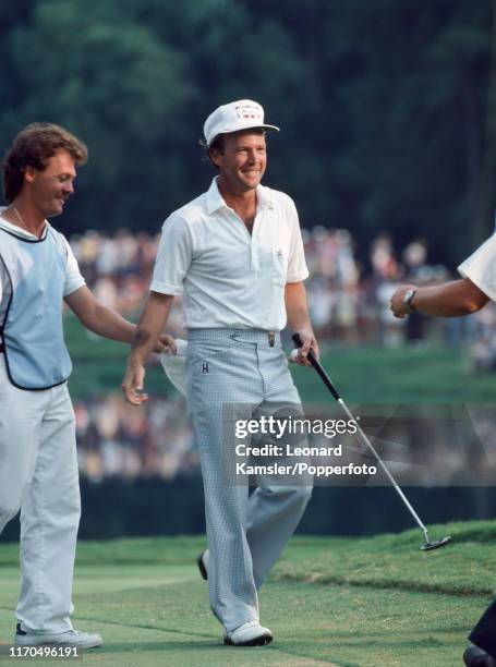 American golfer Larry Nelson with his caddy after winning the US PGA Championship at the Atlanta Athletic Club in Duluth, Georgia on 9th August 1981.