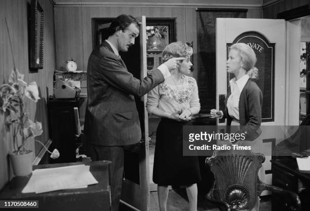 Actors John Cleese, Prunella Scales and Connie Booth in a scene from episode 'A Touch of Class' of the BBC television sitcom 'Fawlty Towers',...