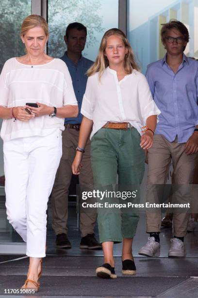 Cristina de Borbón , Irene Urdangarín and Miguel Urdangarín are seen arriving to visit his father King Juan Carlos at Quiron Hospital on August 26,...