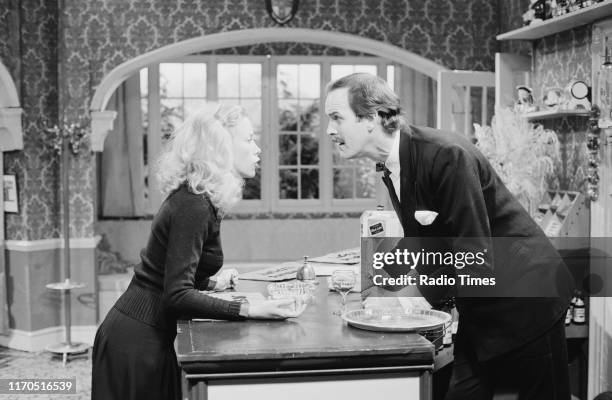 Actors Connie Booth and John Cleese in a scene from episode 'Gourmet Night' of the BBC television sitcom 'Fawlty Towers', September 6th 1975.