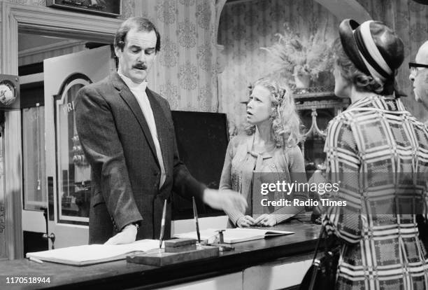 Actors John Cleese and Connie Booth in a scene from episode 'The Germans' of the BBC television sitcom 'Fawlty Towers', August 31st 1975.