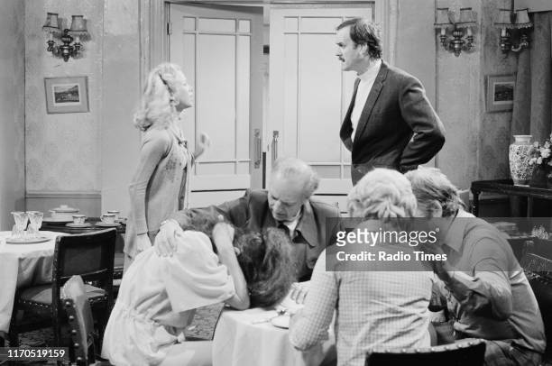 Actors Connie Booth, Willy Bowman and John Cleese in a scene from episode 'The Germans' of the BBC television sitcom 'Fawlty Towers', August 31st...
