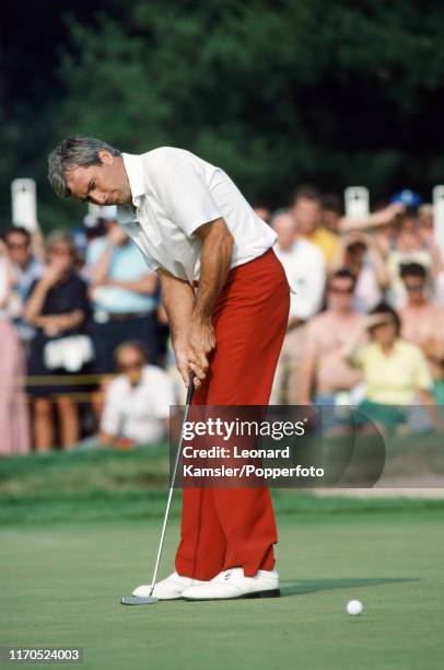 American golfer Curtis Strange putting enroute to his first of two consecutive victories in the US Open Golf Championship at The Country Club in...