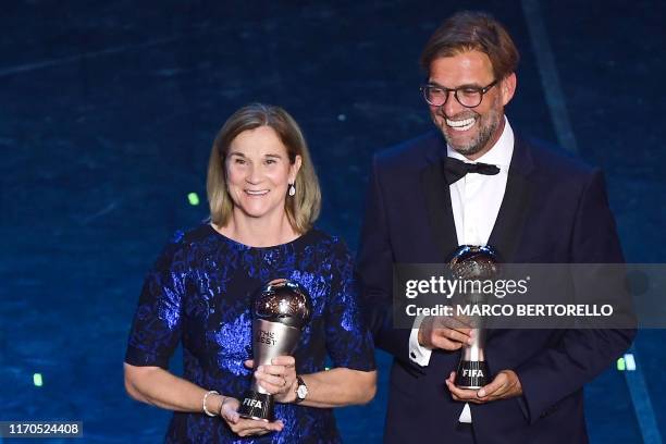 Best FIFA Women's Coach of 2019, USA head coach Jill Ellis and Best FIFA Men's Coach of 2019 Liverpool coach, Germany's Juergen Klopp pose at the end...