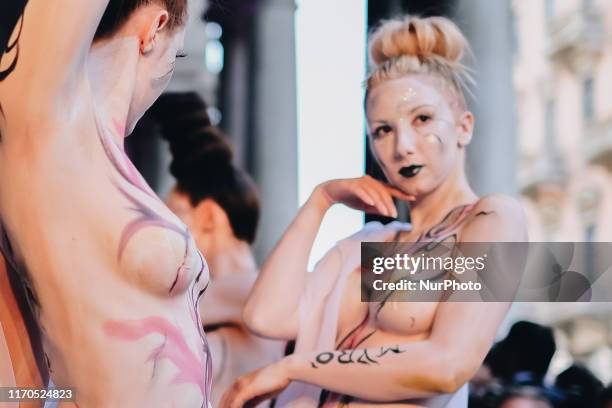 This image contains nudity) Models walk the runway at the Mad Mood show during the Milan Fashion Week Spring/Summer 2020 on September 19, 2019 in...