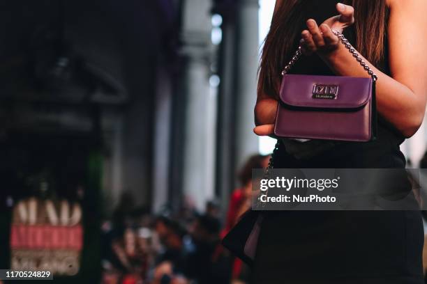 Model walks the runway at the Mad Mood show during the Milan Fashion Week Spring/Summer 2020 on September 19, 2019 in Milan, Italy.