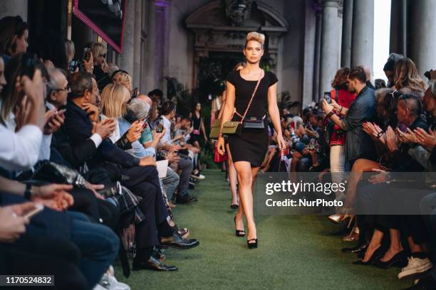 Model walks the runway at the Mad Mood show during the Milan Fashion Week Spring/Summer 2020 on September 19, 2019 in Milan, Italy.