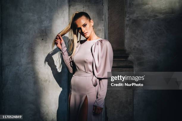 Model walks the runway at the Mad Mood show during the Milan Fashion Week Spring/Summer 2020 on September 19, 2019 in Milan, Italy.