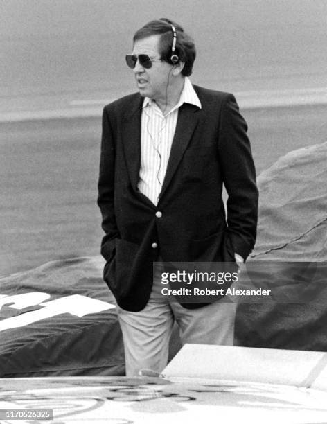 Chief executive officer Bill France Jr. Surveys the speedway scene prior to the start of the 1983 Daytona 500 stock car race at Daytona International...