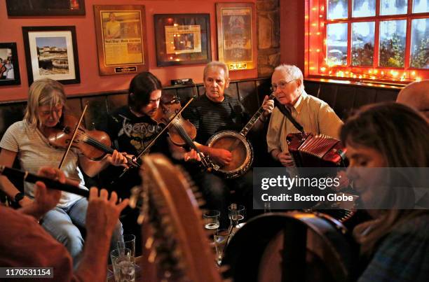 From left, Fiddler Alexandra Galperin plays beside fiddler Sean Connor, banjo player Terry O'Shea, and accordion player Tommy Sheridan during an...