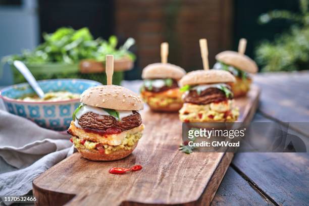 mini veggie burger with grilled cheese, mushroom, guacamole and arugula - burger grill stock pictures, royalty-free photos & images