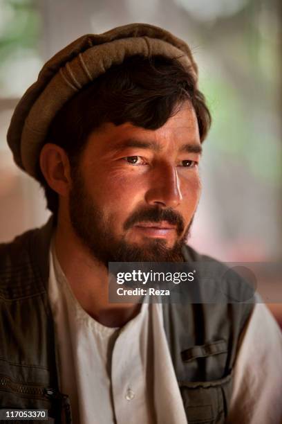 Portrait of a Hazara Afghan in charge of taking care of the guests at House of Taj Odine, Commander Massoud's father-in-law, May 11, 2009 in Bazarak,...