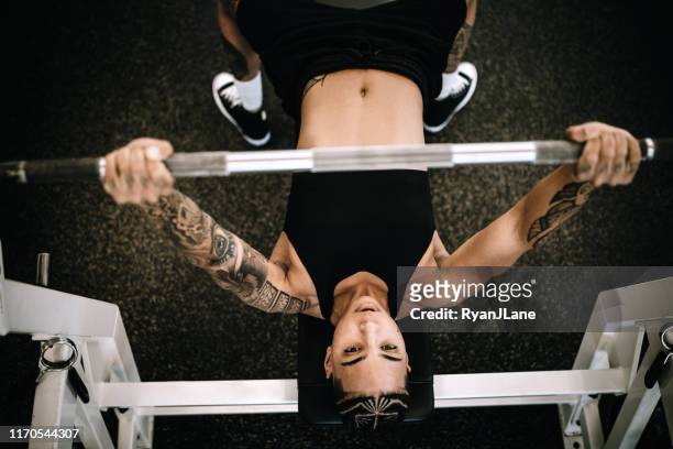 strong and fit woman working out in gym - women's weightlifting stock pictures, royalty-free photos & images