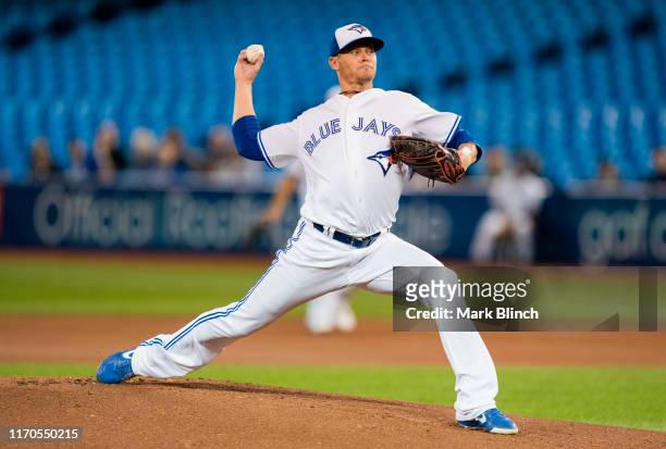 Clay Buchholz of the Toronto Blue Jays pitches to the Baltimore Orioles in the first inning during their MLB game at the Rogers Centre on September...
